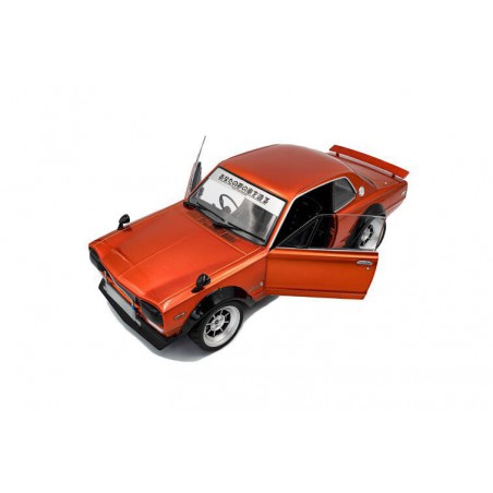 Nissan Skyline (C10) Hakosuka Solido Works '70, oranje - 1:18 - Solido