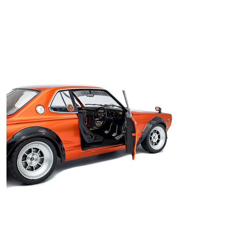 Nissan Skyline (C10) Hakosuka Solido Works '70, oranje - 1:18 - Solido